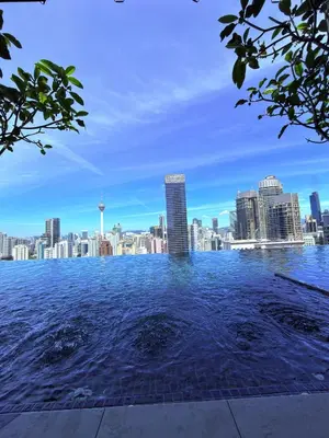 a view of the city from the infinity pool at Luxury Axon Residence Bukit Bintang KLCC Pavilion By EQZ in Kuala Lumpur