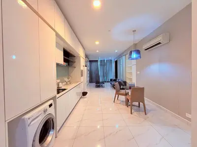 a kitchen and living room with a washer and dryer at Platinum Kuala Lumpur By NewMoon in Kuala Lumpur