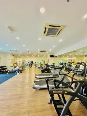 a gym with a bunch of cardio equipment in a room at Times Square Services suite at kl Bukit Bintang SAkL in Kuala Lumpur