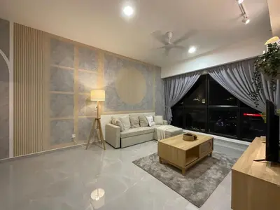 a living room with a couch and a table at Earthy 2BR @ Agile BB | Wi-Fi + Netflix in Kuala Lumpur