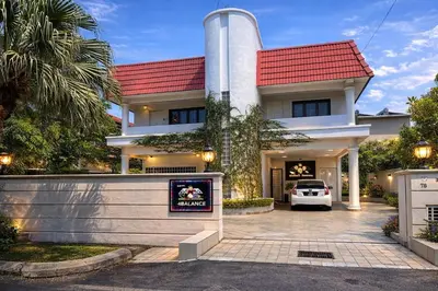 a house with a sign in front of it at 9 Min KLCC 9KM Mid Valley Karaoke 30Pax 7Car in Kuala Lumpur