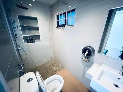 a bathroom with a toilet and a sink and a shower at 9 Min KLCC 9KM Mid Valley Karaoke 30Pax 7Car in Kuala Lumpur