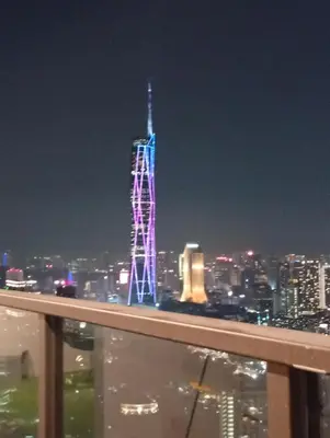a view of the eiffel tower at night at B&B at TRION KL in Kuala Lumpur