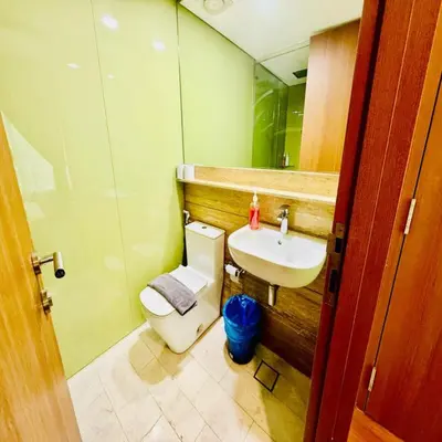 a bathroom with a toilet and a sink at sky suites klcc by Sweet home Apartment in Kuala Lumpur