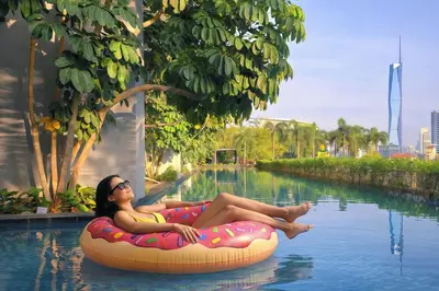 a woman laying on an inflatableynchronousynchronousynchronousynchronousynchronousynchronousynchronousynchronous at Trion Kuala Lumpur in Kuala Lumpur