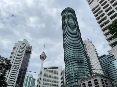 a tall building with a view of the space needle at VORTEX SUITES KLCC By SKYLINE in Kuala Lumpur