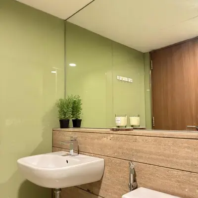 a bathroom with a sink and a mirror at 30 OFF Monthly l Premium 3BR Suite in KLCC in Kuala Lumpur