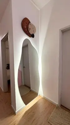 a room with a hallway with a wall with a bear clock at KayooKiddieHouse KLCC Kids Friendly at Kg Baru KL in Kuala Lumpur
