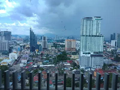 a view of a city with tall buildings at The Luxe Suites Colony Sky Pools in Kuala Lumpur
