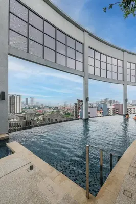 a swimming pool on the roof of a building at The Atrium by The Conts in Kuala Lumpur
