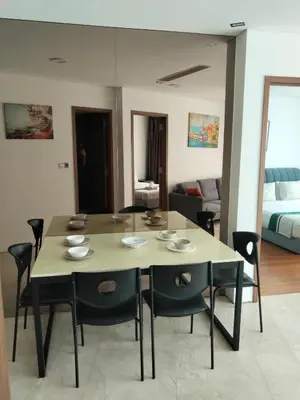 a dining room with a table and chairs at Vortex suites Klcc near KL Area in Kuala Lumpur