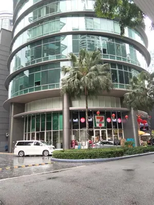 a white car parked in front of a building at Vortex suites Klcc near KL Area in Kuala Lumpur