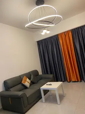 a living room with a couch and a table at Agile Heaven Luxury Suite bukit bintang in Kuala Lumpur