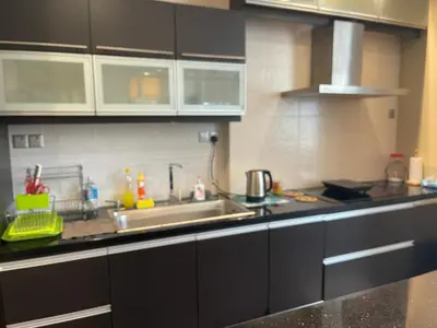 a kitchen with a sink and a counter top at Kuala Lumpur luxury Duplex suits in Kuala Lumpur