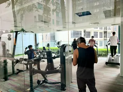 a group of people exercising in a gym at Chod ling pong by mercu summer KLCC in Kuala Lumpur
