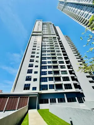 a tall white apartment building with a blue sky at Agile Residence Kuala Lumpur Bukit Bintang in Kuala Lumpur