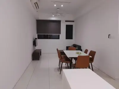 a dining room with white tables and chairs at Mix Home At Chamber Residence in Kuala Lumpur