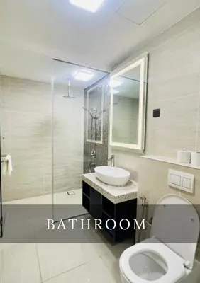 a bathroom with a toilet and a sink and a shower at Metro Star KLCC Living in Kuala Lumpur