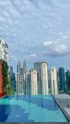 a large swimming pool on top of a city skyline at Majestic Premium Residence Suites KLCC by Alaman in Kuala Lumpur