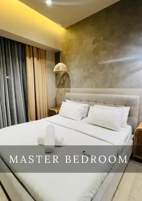 a bedroom with two beds in a room at Urban Star Residence KLCC in Kuala Lumpur