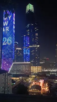 a view of a city at night with at Elite Suites at Agile Bukit Bintang Kuala Lumpur in Kuala Lumpur