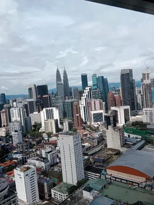 a view of a large city with tall buildings at Realty Services Suites at Berjaya Times Square in Kuala Lumpur