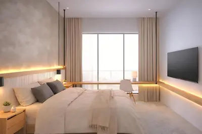 a bedroom with a large bed and a flat screen tv at THRÉS Signature - Trion KL in Kuala Lumpur