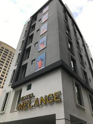 a building with a hotel mel exchange sign on it at Melange Boutique Hotel Bukit Bintang in Kuala Lumpur