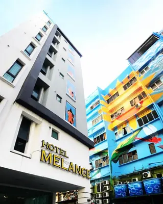 a hotel malanca building with a hotel miami sign at Melange Boutique Hotel Bukit Bintang in Kuala Lumpur