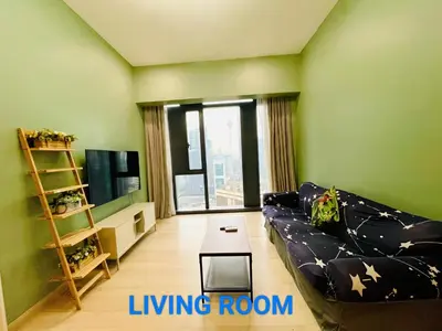 a living room with a couch and a table at Star Residences Suites Home in Kuala Lumpur
