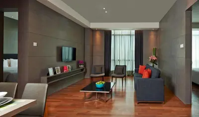 a living room with a couch and a table at VE Hotel & Residence in Kuala Lumpur