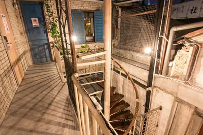 an overhead view of a stairs in a building at Chinatown Hostel by Mingle - Rooftop Private Jacuzzi with Bar in Kuala Lumpur