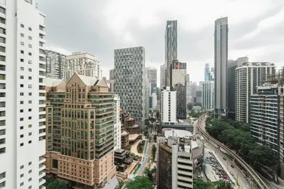 an aerial view of a city with tall buildings at Vortex KLCC Apartments in Kuala Lumpur