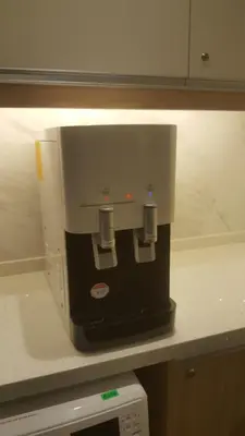 a microwave sitting on top of a counter at Parkview Service Apartments in Kuala Lumpur