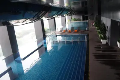 a large swimming pool in a building at M City Lake View KLCCAmpang in Kuala Lumpur