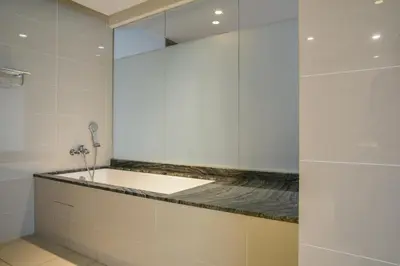 a bathroom with a sink and a mirror at D'Majestic Place by Widebed in Kuala Lumpur