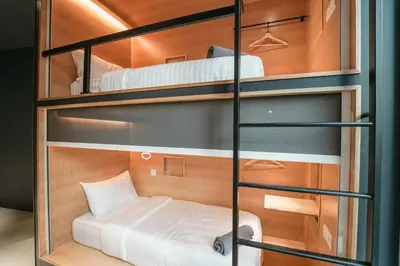 a room with a bunk bed in a room at The Bed KLCC in Kuala Lumpur