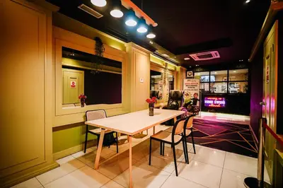 a dining room with a table and chairs at Kingston Hotel 1 - Bukit Bintang in Kuala Lumpur