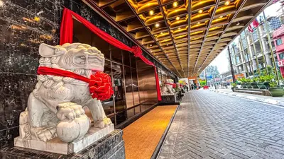 a statue of a lion on the side of a building at The Federal Kuala Lumpur in Kuala Lumpur