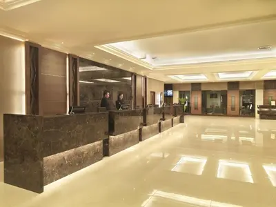 a lobby of a hotel with a reception desk at Cititel Mid Valley in Kuala Lumpur