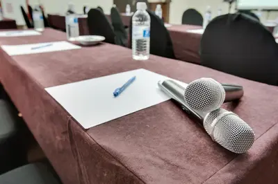 a table with two microphones on top of it at Prescott Hotel Kuala Lumpur Medan Tuanku in Kuala Lumpur