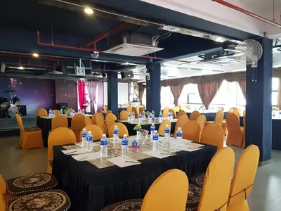 a conference room with a table and chairs at WTC Hotel, Kuala Lumpur - Formerly Leo Palace Hotel Classic Wing in Kuala Lumpur