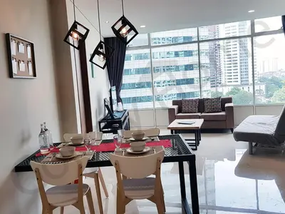 a dining room with a table and chairs and a large window at 5 STAR & LUXURY Apartment near KLCC/ KL City Centre in Kuala Lumpur