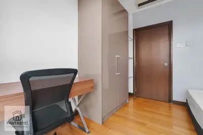 a room with a desk and a bed and a door at Regalia Residence @ KLCC View Sky Pool by MC in Kuala Lumpur