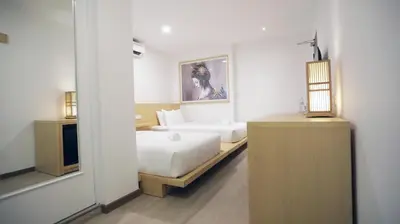 a bedroom with a bed and a television in a room at Vivids Hotel in Kuala Lumpur