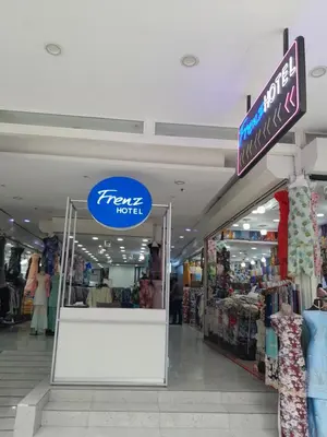 a store with a sign for a tapse hotel at Frenz Hotel Kuala Lumpur in Kuala Lumpur