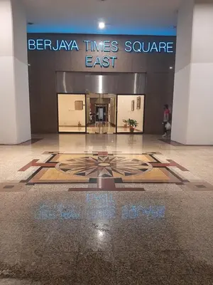 a building with a star on the floor of a lobby at Genius Service Suites at time square kl in Kuala Lumpur