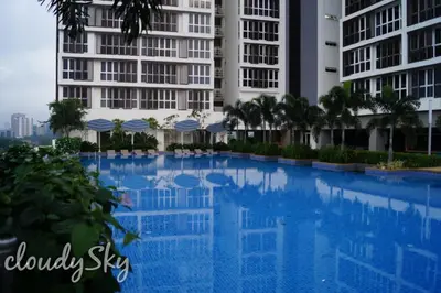 a large swimming pool in front of some buildings at Sentrio Pandan Kuala Lumpur in Kuala Lumpur