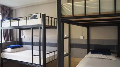 a bunk bed room with two bunk beds at Leo Backpackers @ Central Market in Kuala Lumpur
