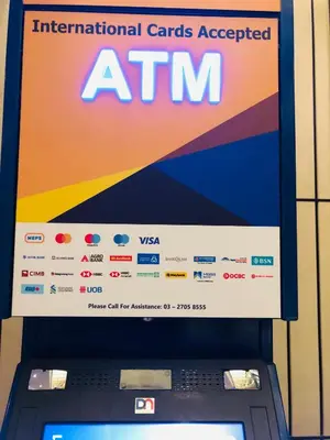 an atm website on top of a laptop computer at Suasana Bukit Ceylon Residence in Kuala Lumpur